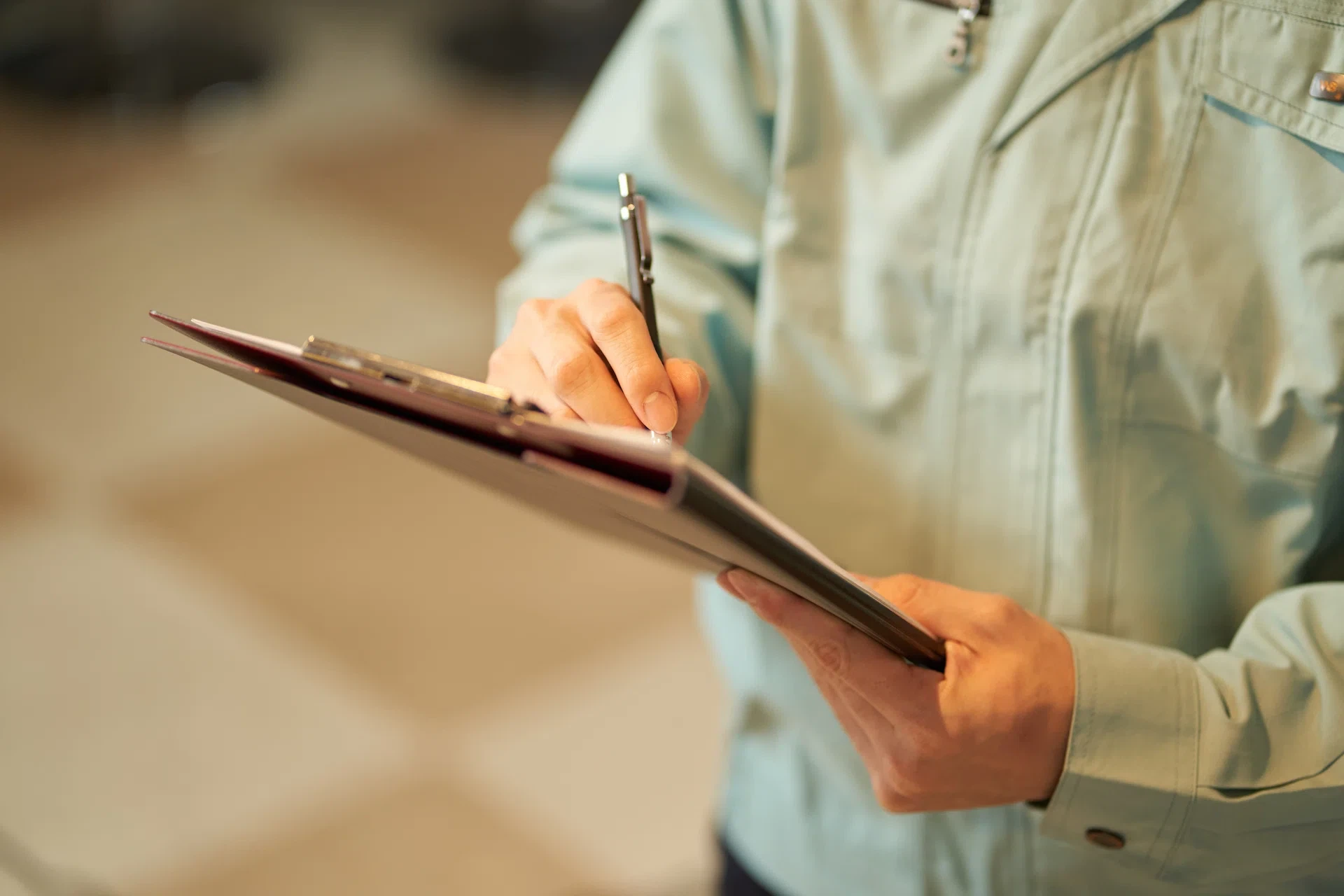 Restaurant operator inspecting kitchen equipment — back-of-house tools we've built